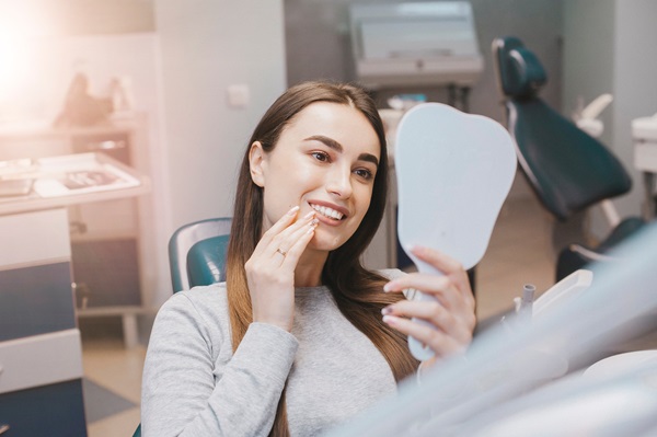 When Should You Choose A Dental Bridge Over An Implant?